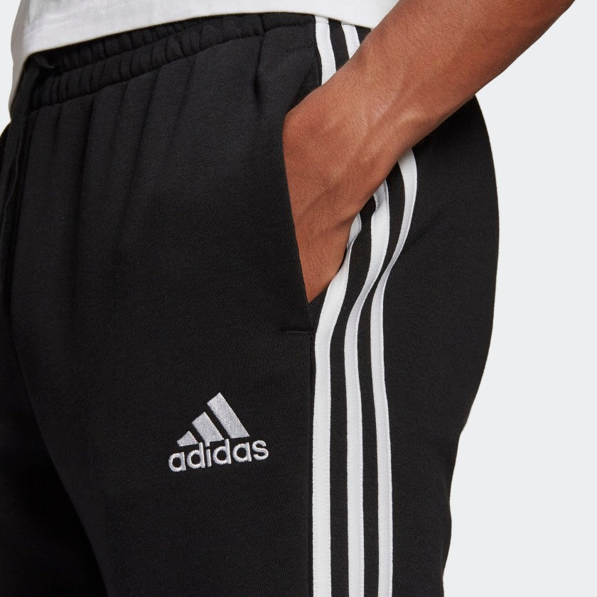 adidas ESSENTIALS FRENCH TERRY Tapered-Cuff 3-Stripes Pants | Black-White | Men's