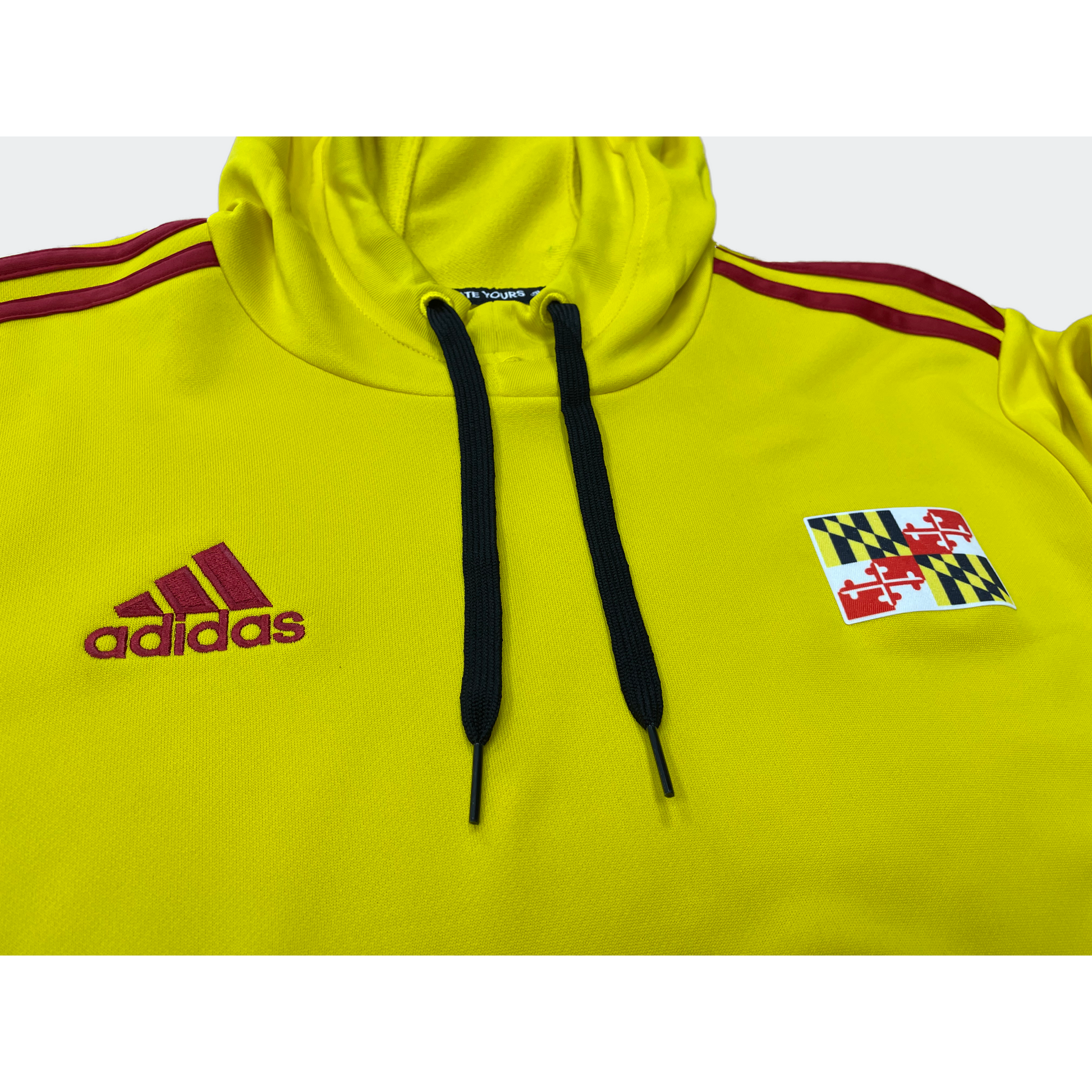Yellow adidas hoodie with black deals stripes